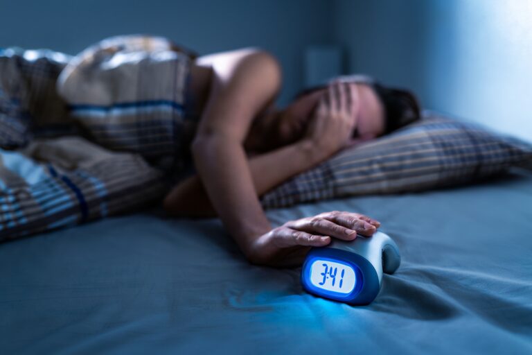 woman struggling with sleep apnea