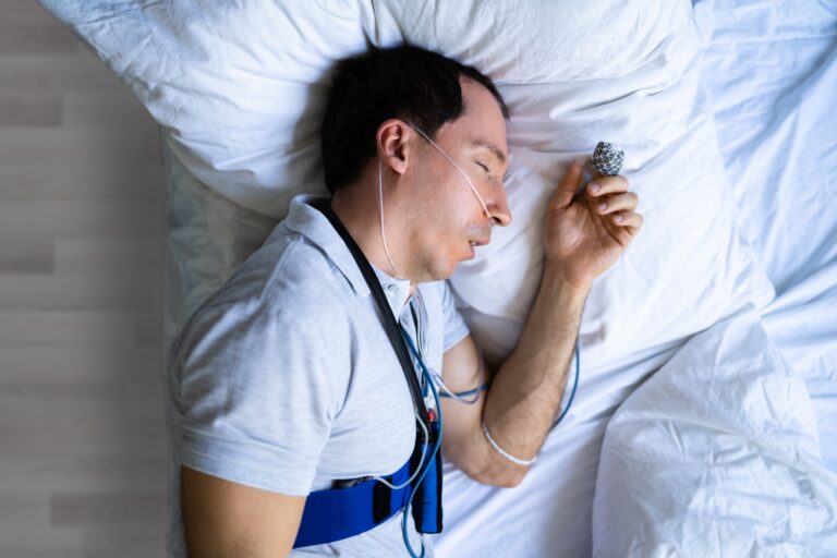 man undergoing a sleep apnea diagnosis test