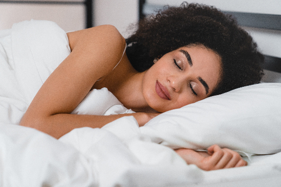 young woman sleeping comfortably, oral appliance therapy